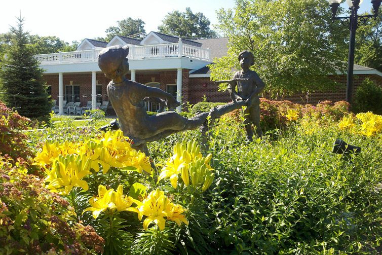 Image Gallery | Statues on the ground of our Memory Care Community